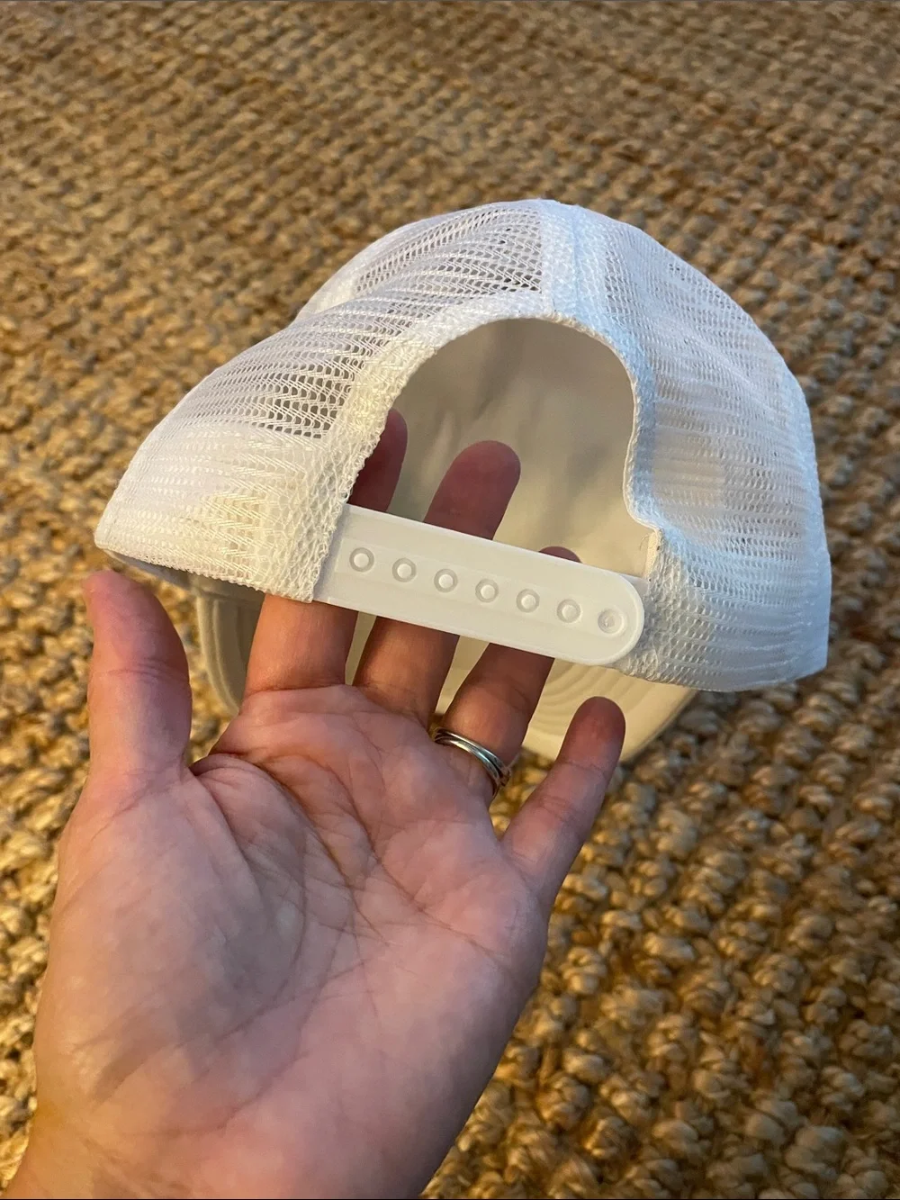 White Trucker Hat with Green Script Accent